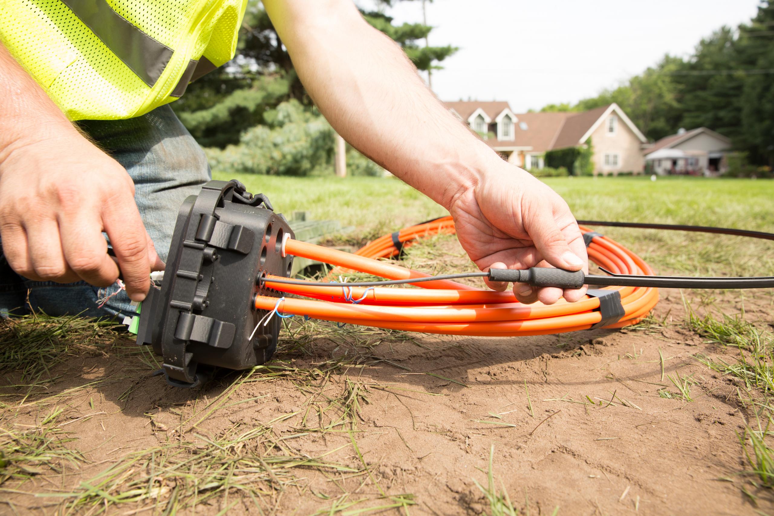 Image of a technician setting up fiber to home using Clearfields products